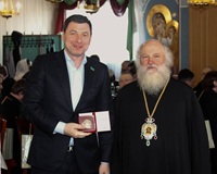 Митрополит Ханты-Мансийский и Сургутский Павел наградил Николая Ташланова памятным знаком